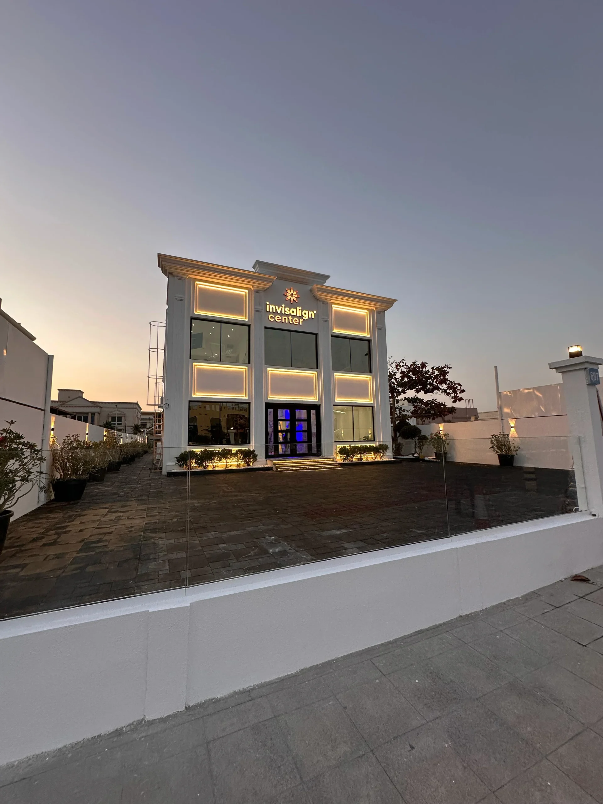 Invisalign Center, building exterior at dusk, fit-out by HQI Contracting